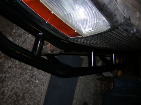 1995 Ford Bronco - Custom bumper and headlight assembly, not a full vehicle view.