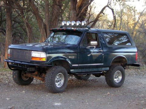 1995 Ford Bronco - This Ford Bronco has a custom front bumper and a light bar mounted on the roof.