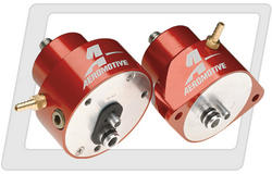 1993 Ford Bronco - Two red Aeromotive fuel pressure regulators are shown against a white background.