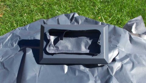 1998 Ford Crown Victoria - A close-up of the lamp housing, after being painted with Ford OEM interior pant.