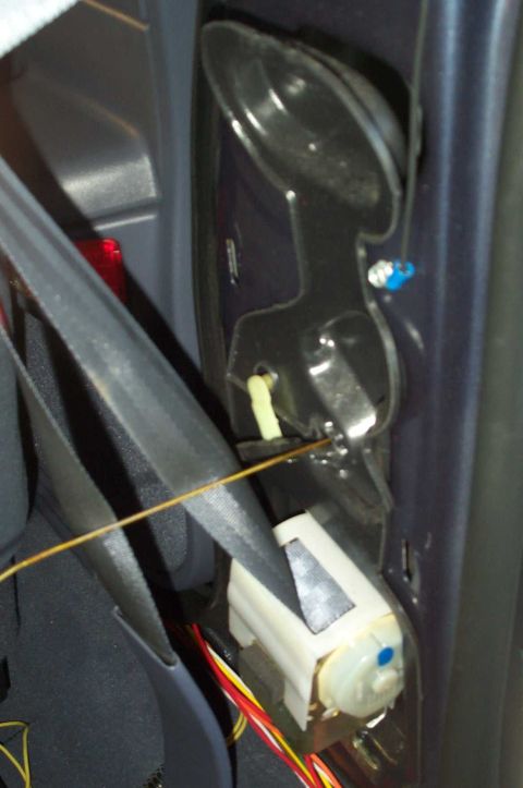 1998 Ford Crown Victoria - I used a coathanger to snake up through the door. Note the cut red wire and ground wire. Apparently something else from my Vic's days with…