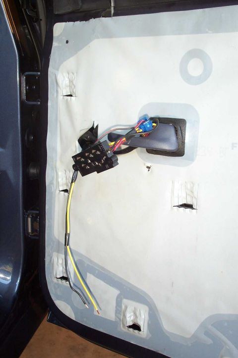 1998 Ford Crown Victoria - The yellow and black wires that will provide power to the lamps, snaked through the door.