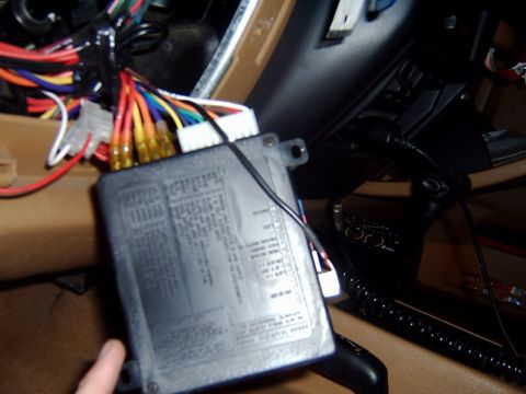 1998 Jeep TJ - A remote start module and its wiring harness are visible, along with a label on the module.