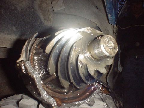 1988 Ford Bronco - Close-up of a broken differential gear, showing significant damage to the teeth.