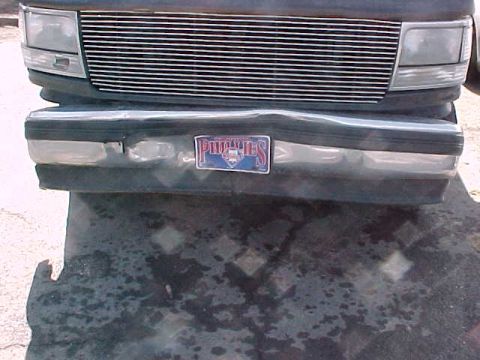 1993 Ford Bronco - Front bumper shows damage and has a Pittsburgh Pirates license plate.