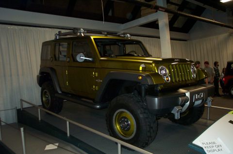 2001 Ford Crown Victoria - This Jeep Wrangler concept vehicle is on display with a roof rack and off-road tires.