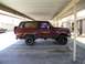 1989 Ford Bronco - This maroon Ford Bronco appears to be from the early 1980s, not a 1989 model as claimed.