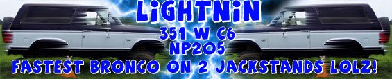 Banner of blue Ford Bronco with lightning text LIGHTNIN 351W C6 NP205 fastest Bronco on 2 jackstands