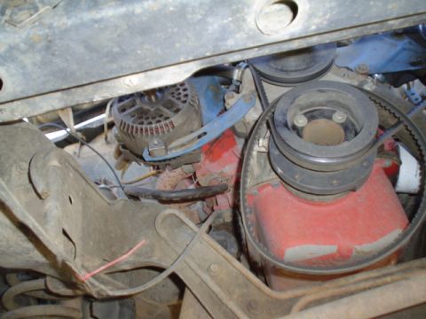 1981 Ford Bronco - view from the bottom. I needed to run a nut and bolt now since the Alts mounting tab is straight threw instead of threaded.