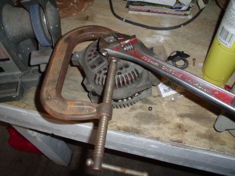 1981 Ford Bronco - handy thought I had to tighten up the pully. The guy at the parts store that removed the serp belt one used an impact and held it with a pa…