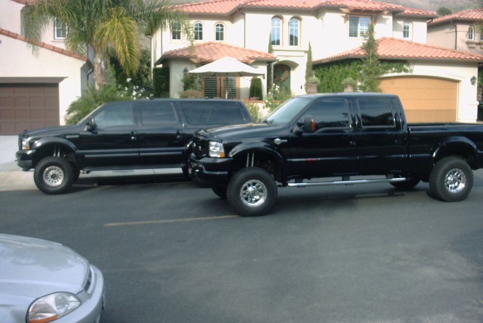 My new SD in front of my Excursion.  The X has a new owner now and I am sure he is being good to her.  She still looks great!

Thanks Dave...keep her nice!