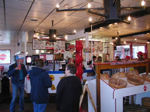 1967 Ford Ranchero - Diner interior with customers at the counter and menus displayed overhead.