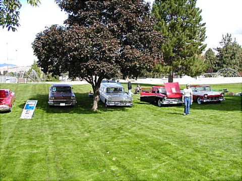1967 Ford Ranchero - A gathering of vintage automobiles on display at an outdoor event.