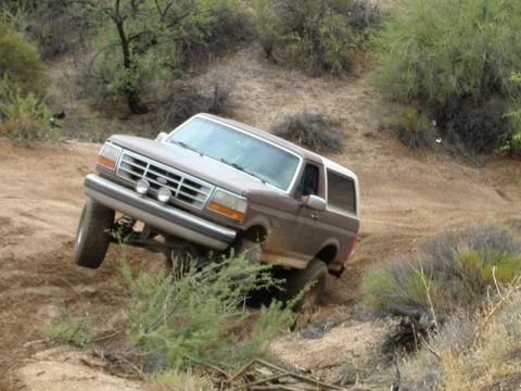 1993 Ford Bronco - This 1993 Ford Bronco navigates a challenging off-road trail.