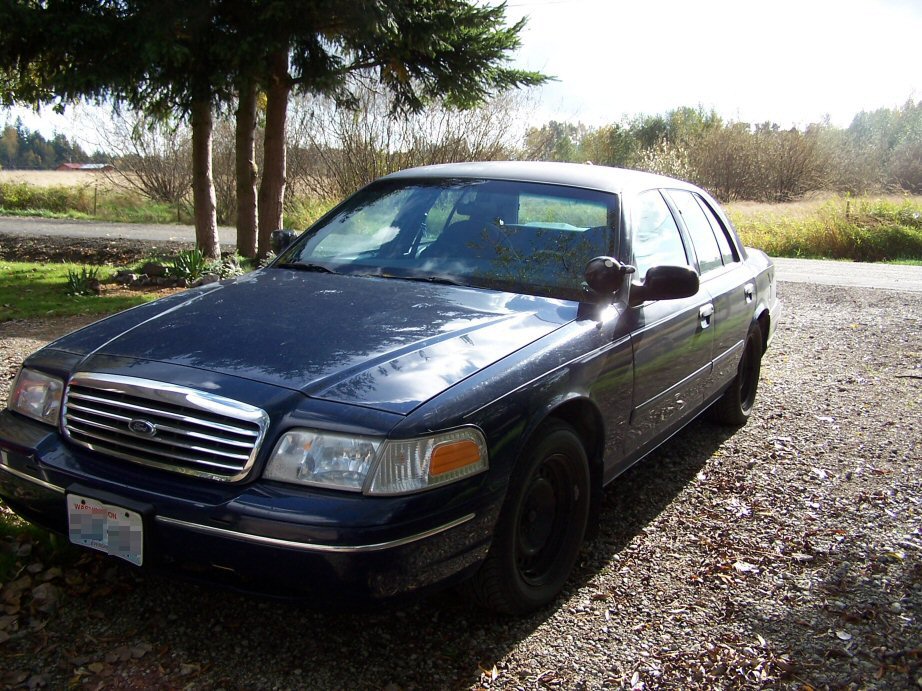 Dark blue 1998 Ford Crown Victoria parked outdoors