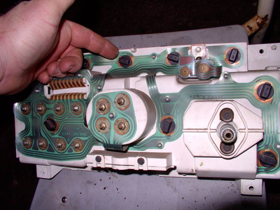 These top ones for high beams, signals,etc can be easily replaced from the front just by removing the dash trim around the cluster and.........