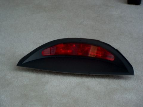 1998 Ford Taurus - A detached third brake light assembly is shown against a neutral background.