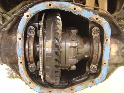 1993 Ford Bronco - Close-up view of a vehicle's differential gears and housing, showing internal components.