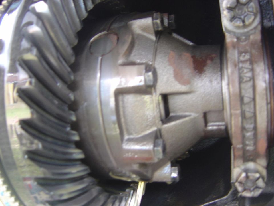 Close-up of differential gears and housing with visible text 'STAA'