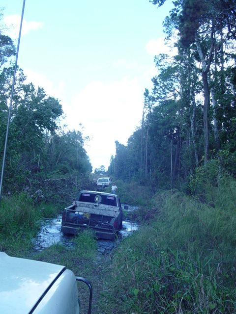 1989 Ford Bronco - Hoss hits the first mud hole of the ride