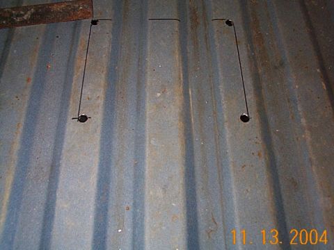 1986 Ford Bronco - Lines are drawn on a metal surface, indicating where cuts will be made.