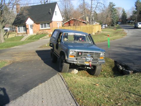 1986 Ford Bronco - This 1986 Ford Bronco, equipped with a winch, is shown in a 3q-front view.