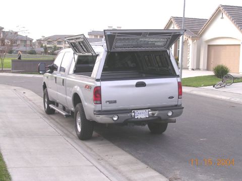 2004 Ford F-250 - the little windows slide open also for when the dog is in the back or when camping