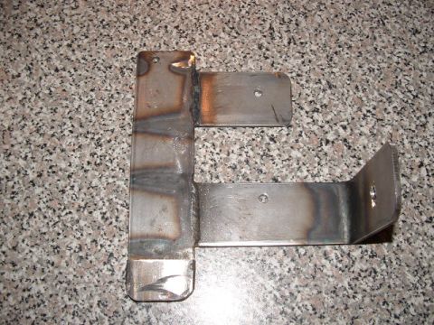 1990 Ford Bronco - This custom metal bracket appears to be fabricated for a specific purpose, possibly for vehicle modification.