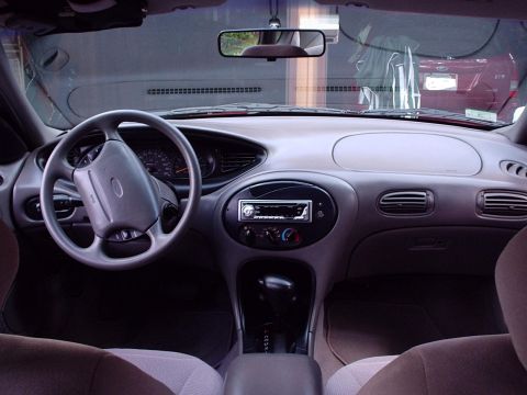 1998 Ford Taurus - Interior view of a 1998 Ford Taurus, highlighting the dashboard and controls.