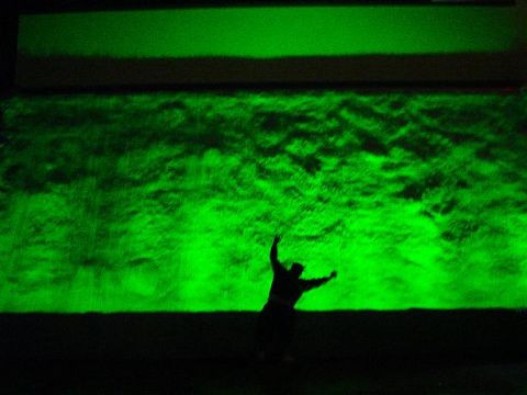1996 Ford Probe - A person is silhouetted against a vibrant green textured background, with a dark band at the top.