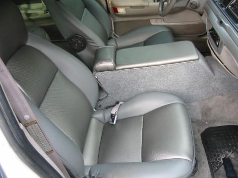 1997 Ford Crown Victoria - Interior view of a 1997 Ford Crown Victoria, showing front seats and console.