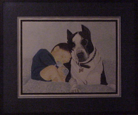 1989 Ford Bronco - A framed drawing depicts a baby sleeping soundly next to a loyal dog.