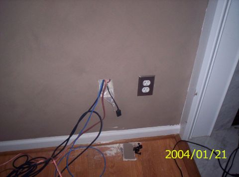 1986 Ford Bronco - Exposed wiring and electrical outlets are visible on a wall, with a date stamp of 2004/01/21 and SuperMotors.net logo.