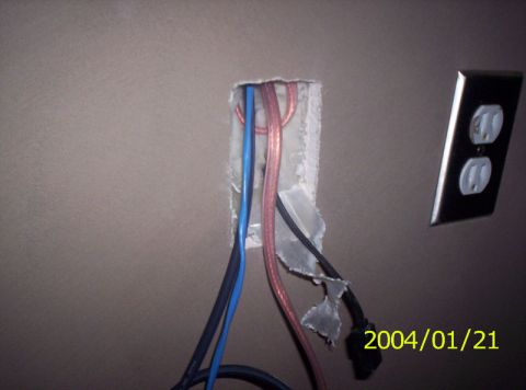 1986 Ford Bronco - Exposed wiring and an electrical outlet are visible in this image, with a date stamp of 2004/01/21.