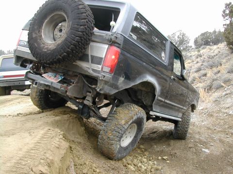 1994 Ford Bronco - This 1994 Ford Bronco navigates a steep, sandy incline during an off-road excursion.
