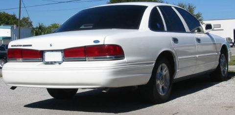 1997 Ford Crown Victoria - Rear view of a white 1997 Ford Crown Victoria sedan.