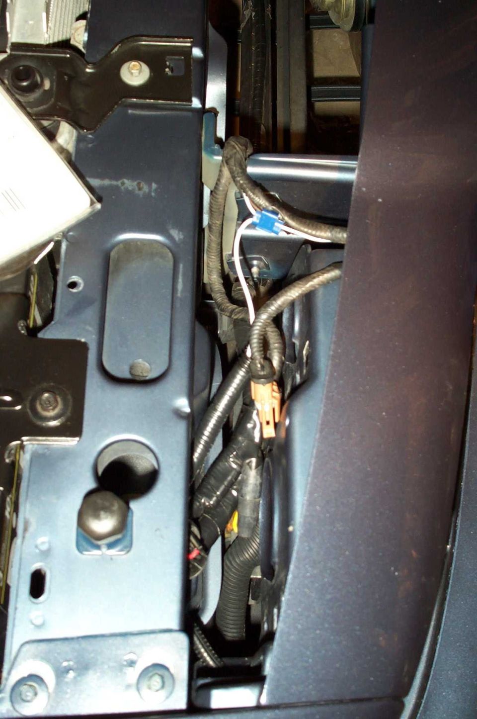 Here you can see where I spliced into the turn signal wire and attached a new wire that will attach to the ground wire of the marker lamp.