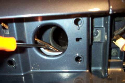 1998 Ford Crown Victoria - Here's a pic of the wire routing, viewed from where the headlights are typically mounted. Again, a screwdriver points to the new wire and i…
