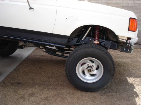 1987 Ford Bronco - Modified 1987 Ford Bronco shows off its suspension system and aftermarket wheels.