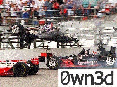 1985 Ford Bronco - A dramatic crash unfolds on the race track, with one car airborne and debris scattering.