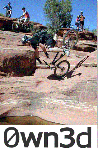 1985 Ford Bronco - Several mountain bikers navigate a challenging rocky trail under a clear blue sky.