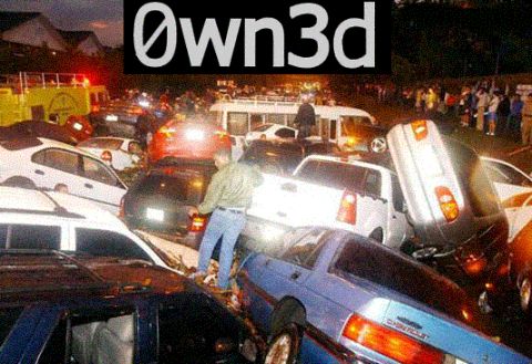 1985 Ford Bronco - Nighttime scene of dozens of cars and pickups piled and stacked on top of one another in a flood-strewn jumble, headlights and emergency li…
