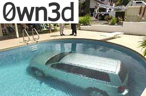 1985 Ford Bronco - A light-colored car sits fully submerged upright in a backyard kidney-shaped swimming pool, its roof and windshield just visible under the…