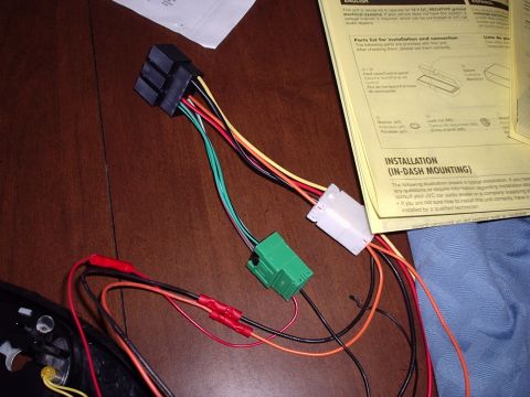 1998 Ford Taurus - Wiring harness and installation instructions for a car radio.
