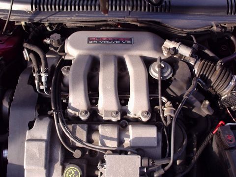 1998 Ford Taurus - Close-up of a Duratec 24 Valve V6 engine, focusing on the intake manifold.