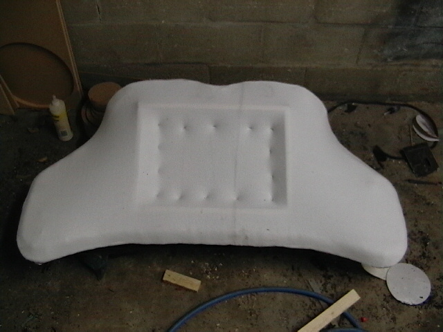 White foam car part with rectangular indentation