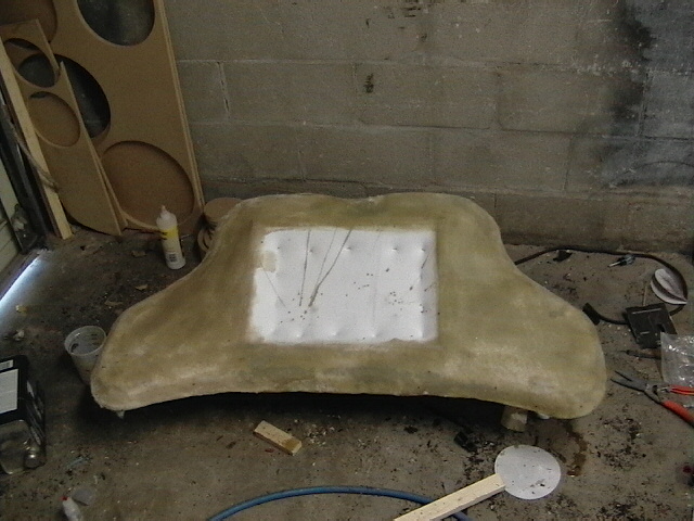 Fiberglass mold with a rectangular cutout, possibly for a car dashboard or console