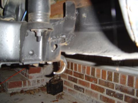 1986 Ford Bronco - Undercarriage view showing suspension components and frame structure.