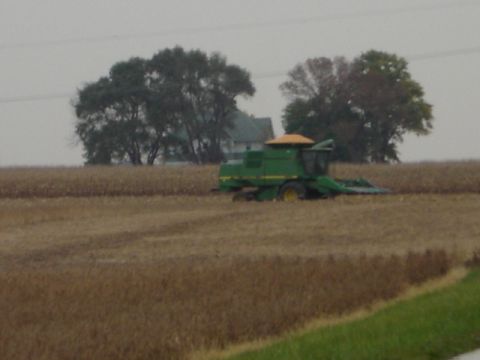 1992 Ford Bronco - A John Deere combine harvester is in operation during harvest season.