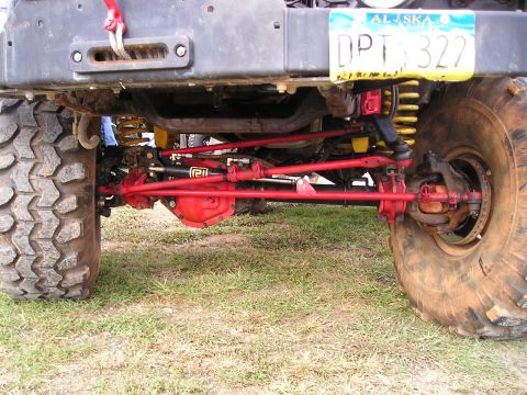 1996 Ford Bronco - The heavy-duty suspension and steering system of an off-road vehicle is shown in detail.